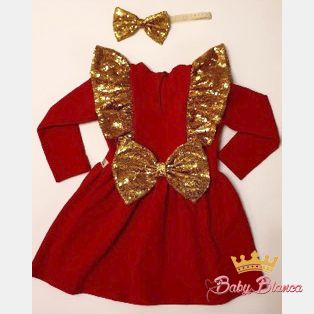 Red dress with golden butterfly wings