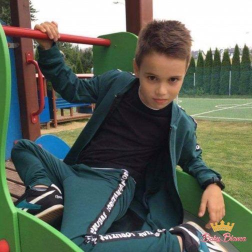 Boy's tracksuit with a stripe bottle green